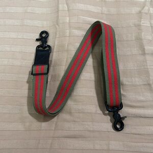 Red and olive strips with black hardware CROSS BODY STRAP
